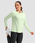 women's hip-length workout long sleeve in mint green - fabric detail view