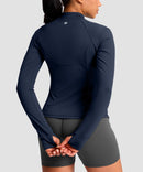 women's longline slim full zip pocketed workout jacket in navy - back view