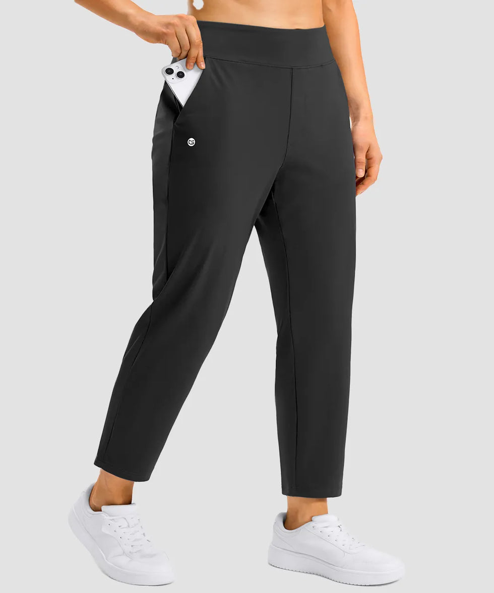 women's pull-on stretchy ankle pants in black - zipper pocket detail view