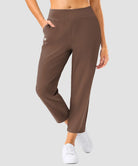women's pull-on stretchy ankle pants in brown - zipper pocket detail view