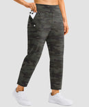 women's pull-on stretchy ankle pants in green camo - zipper pocket detail view
