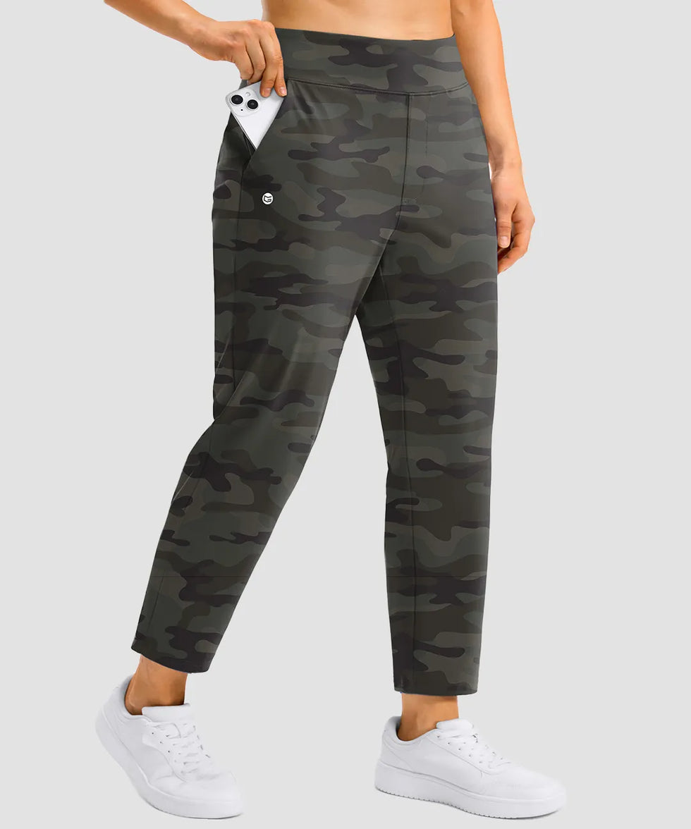 women's pull-on stretchy ankle pants in green camo - zipper pocket detail view