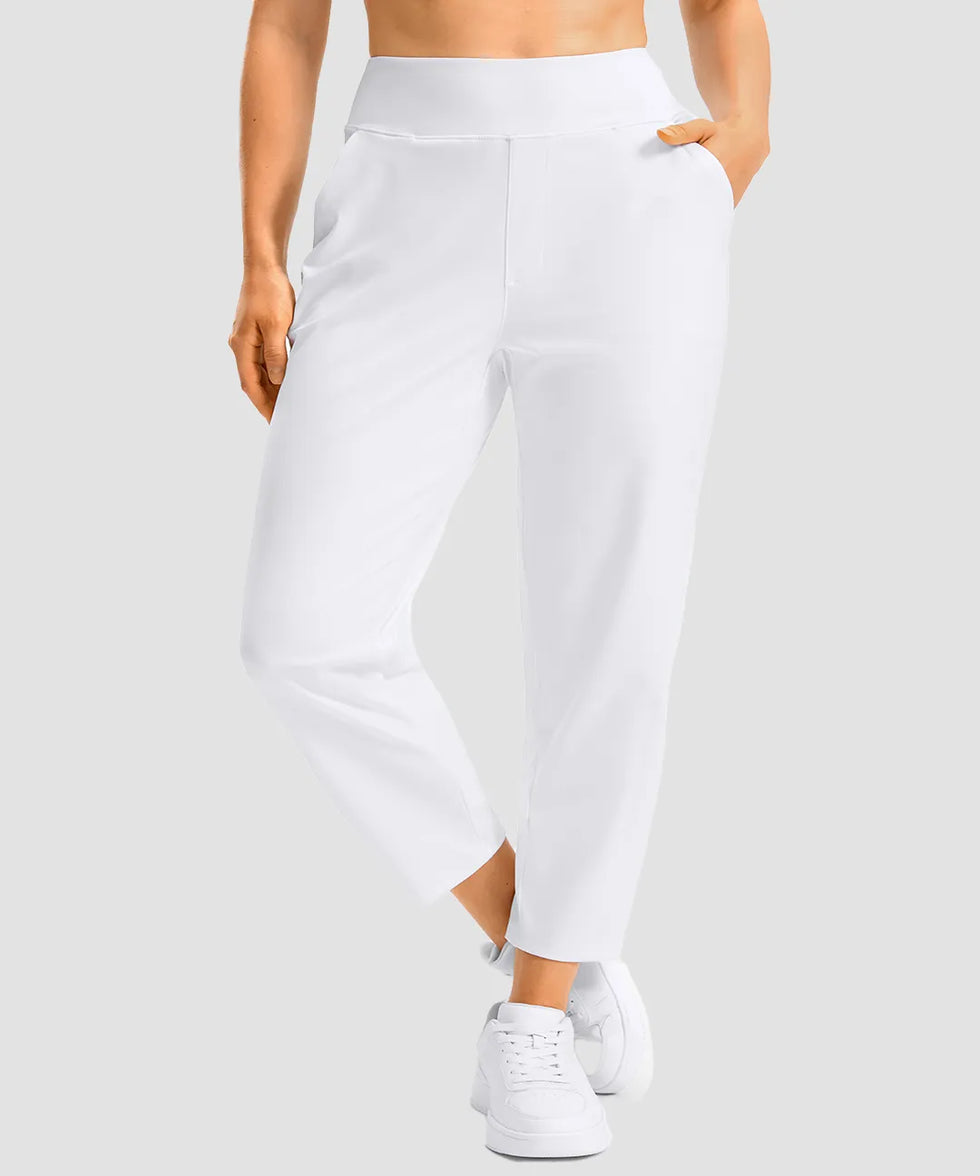 women's pull-on stretchy ankle pants in white - zipper pocket detail view