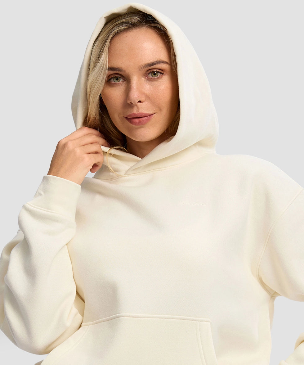 women's solid color oversized fleece hoodie in beige - collar detail view