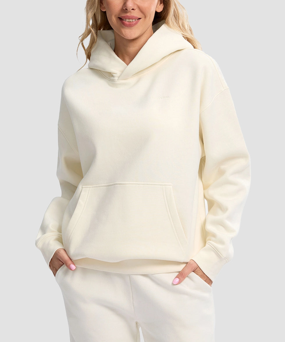 women's solid color oversized fleece hoodie in beige - front view
