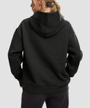 women's solid color oversized fleece hoodie in black - back view