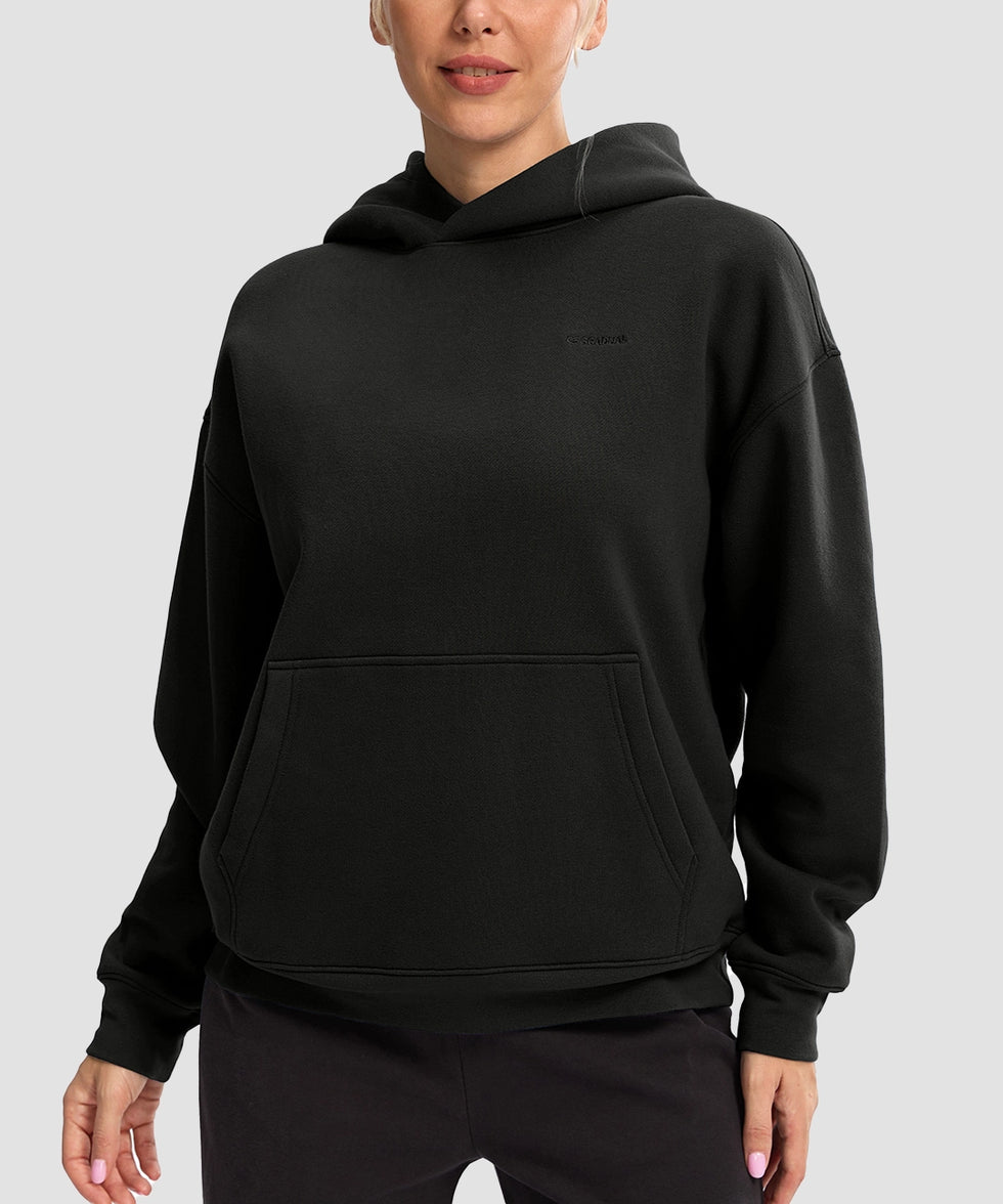 women's solid color oversized fleece hoodie in black - front view