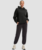women's solid color oversized fleece hoodie in black - matching outfits view