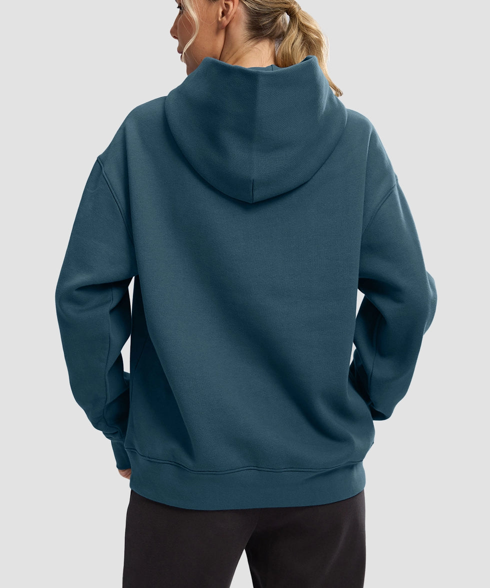 women's solid color oversized fleece hoodie in dark blue - back view