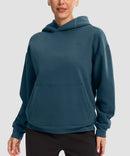 women's solid color oversized fleece hoodie in dark blue - front view