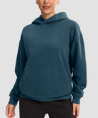women's solid color oversized fleece hoodie in dark blue - front view