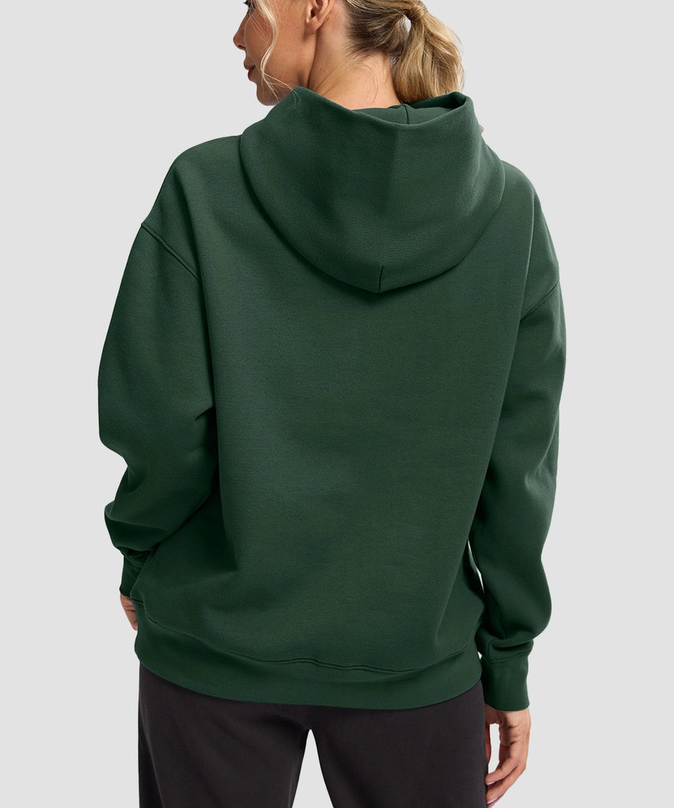women's solid color oversized fleece hoodie in dark green - back view
