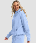 women's solid color oversized fleece hoodie in light blue - side view