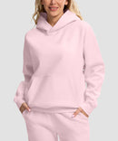 women's solid color oversized fleece hoodie in pink - front view