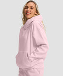 women's solid color oversized fleece hoodie in pink - side view