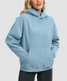 women's solid color oversized fleece hoodie in slate blue - front view