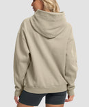 women's solid color oversized fleece hoodie in taupe - back view