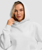 women's solid color oversized fleece hoodie in white - collar detail view