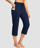 women's straight leg yoga capri pants in navy - pocket details view