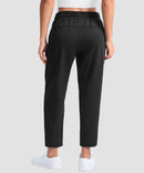 women's stretchy golf pants ankle-length in black - back view