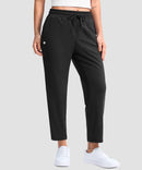 women's stretchy golf pants ankle-length in black - front view