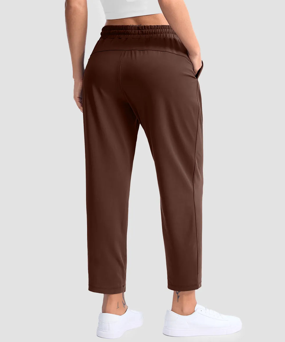women's stretchy golf pants ankle-length in brown - back view