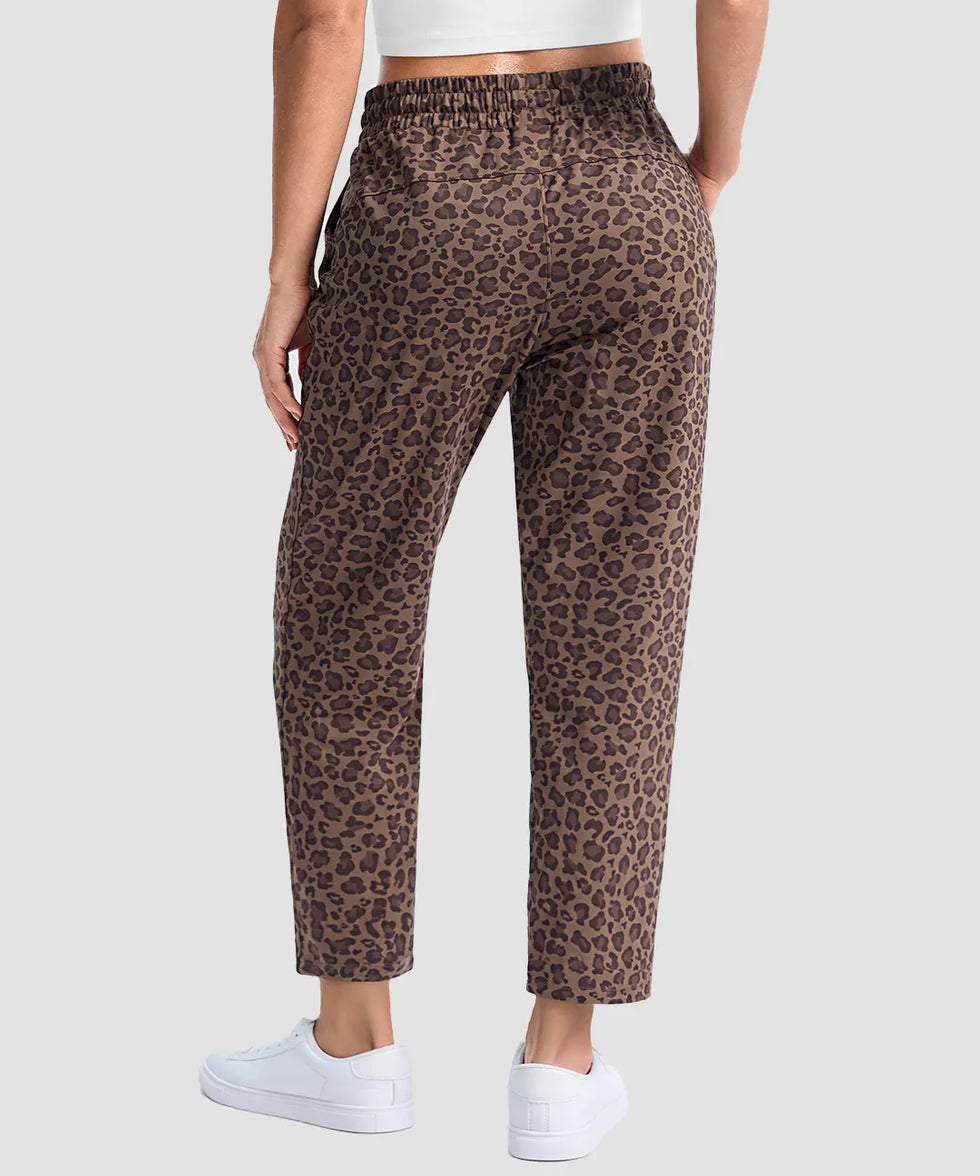 women's stretchy golf pants ankle-length in brown leopard - back view