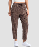 women's stretchy golf pants ankle-length in brown leopard - front view