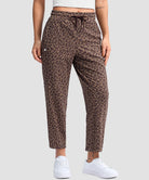 women's stretchy golf pants ankle-length in brown leopard - front view