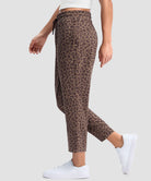 women's stretchy golf pants ankle-length in brown leopard - side view