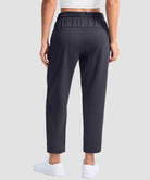 women's stretchy golf pants ankle-length in dark gray - back view
