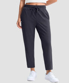 women's stretchy golf pants ankle-length in dark gray - front view