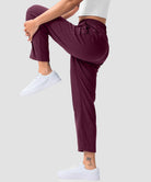 women's stretchy golf pants ankle-length in date red - side view