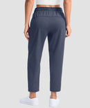 women's stretchy golf pants ankle-length in dusty blue - back view