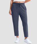 women's stretchy golf pants ankle-length in dusty blue - front view