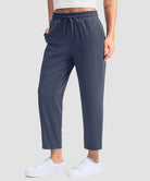 women's stretchy golf pants ankle-length in dusty blue - side view