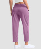 women's stretchy golf pants ankle-length in dusty purple - back view