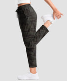 women's stretchy golf pants ankle-length in green camo - side view