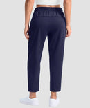 women's stretchy golf pants ankle-length in navy - back view