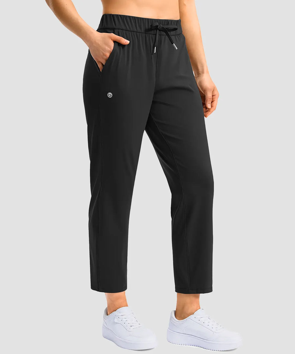women's stretchy waist with pocket ankle pants in black - pocket detail view