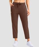 women's stretchy waist with pocket ankle pants in brown - pocket detail view