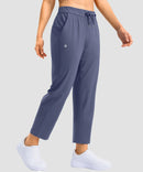 women's stretchy waist with pocket ankle pants in indigo blue - pocket detail view