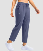women's stretchy waist with pocket ankle pants in indigo blue - pocket detail view