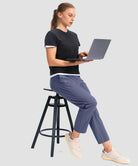 women's stretchy waist with pocket ankle pants in indigo blue - back view