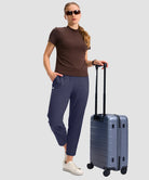 women's stretchy waist with pocket ankle pants in navy - front view