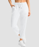women's stretchy waist with pocket ankle pants in white - pocket detail view
