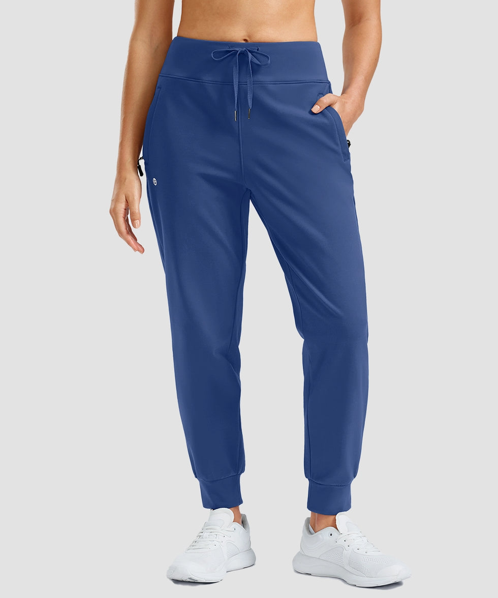 women's thermal with 3 zip pockets joggers in blue - front view