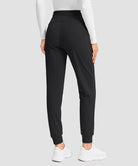 women's water-resistant fleece-lined joggers in black - back view