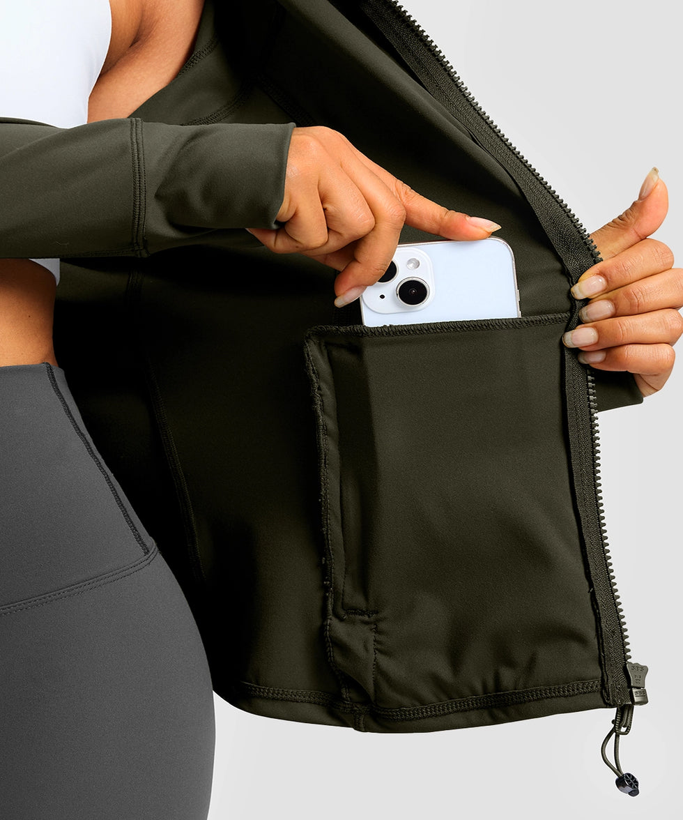 women's zip-up slim fit hip length jacket in army green - pocket details view