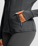 women's zip-up slim fit hip length jacket in dark gray - zipper pocket detail view